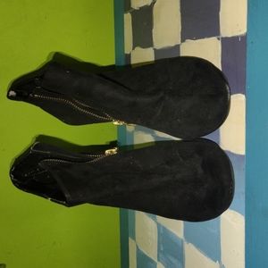 Candy's black ankle boot heels